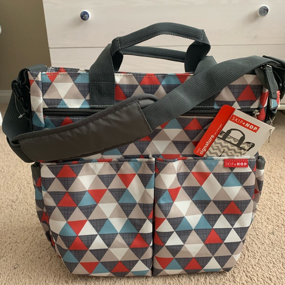 Brand new gender neutral Skiphop diaper bag.